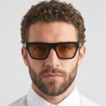 Prada PR  C03S 16K50P Sunglasses Black Sunglasses – Yellow Lens